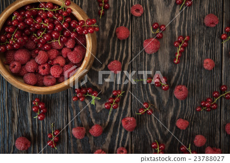Fresh berries on wooden table Fresh berries on wooden table 23788027