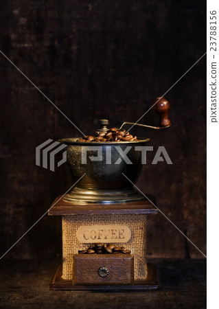 old-fashioned coffee grinder close up old-fashioned coffee grinder close up 23788156
