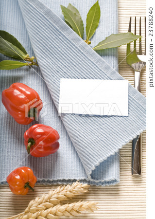 fork and vegetabels on blue napkin fork and vegetabels on blue napkin 23788240