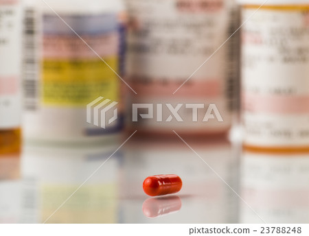 Close up of red pill Close up of red pill 23788248