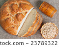 Sliced white bread and seeds of oats 23789322