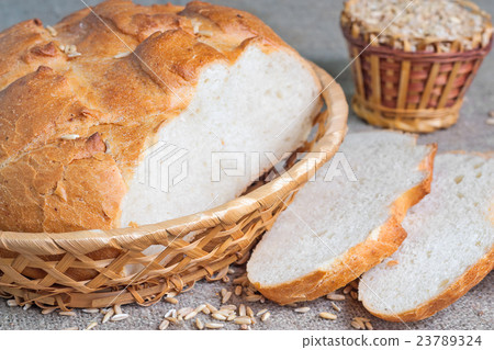 Sliced white bread and seeds 23789324