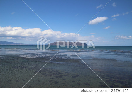Mount Hakodate floating in a calm sea 23791135