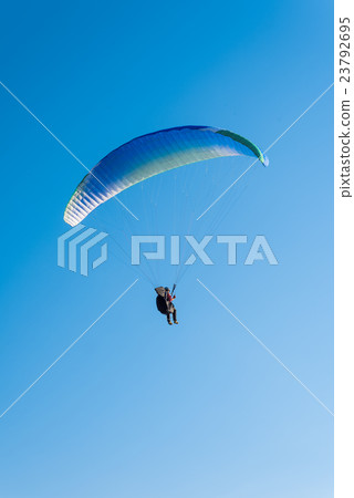Paragliding in the sky 23792695