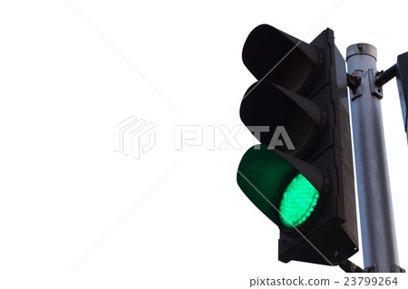 green color on the traffic light isolated 23799264