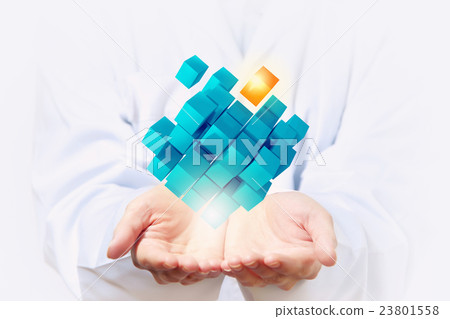 Cube in male hand . Mixed media 23801558
