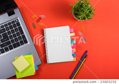 Office table desk with set of colorful supplies 23803258