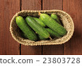 Cucumbers in a basket 23803728