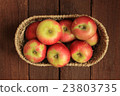 Apples in a basket 23803735
