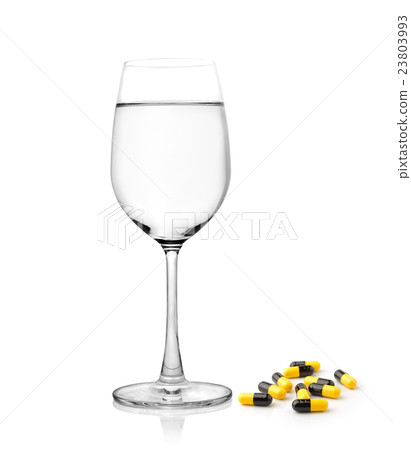 glass of water and pills capsules isolated glass of water and pills capsules isolated 23803993