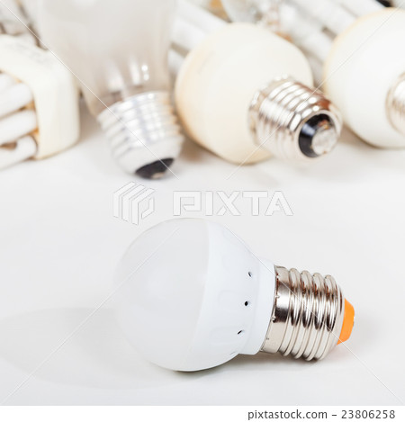 one new LED lamp and several old light bulbs one new LED lamp and several old light bulbs 23806258