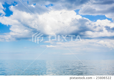 clouds in blue sky over calm water of Azov Sea clouds in blue sky over calm water of Azov Sea 23806522