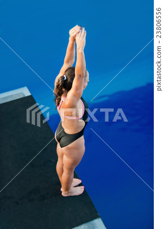 Female diver on platform Female diver on platform 23806556