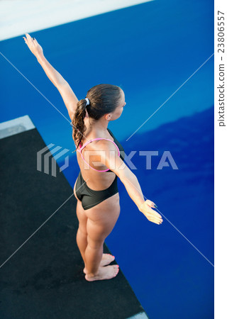Female diver on diving platform 23806557