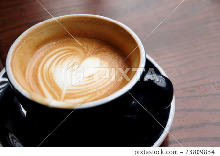 Coffee art with wooden background 23809834