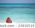 red bag on the beach 23810519