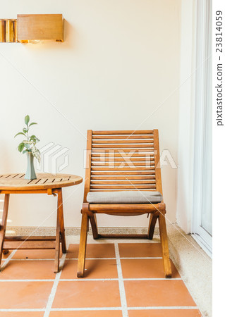 Empty chair and table Empty chair and table 23814059