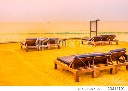 Empty chair on the beach Empty chair on the beach 23814101