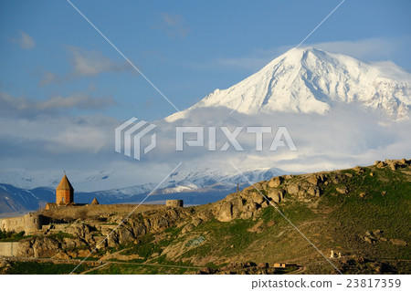 Ancient monastery in front of mountain 23817359
