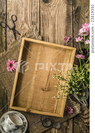 Summer still life with flowers and tea cup 23819392