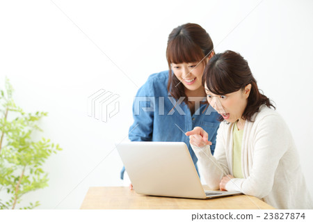 Laptop computer surprised woman Laptop computer surprised woman 23827874