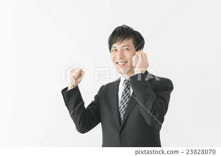 Businessman to pause while talking Businessman to pause while talking 23828070