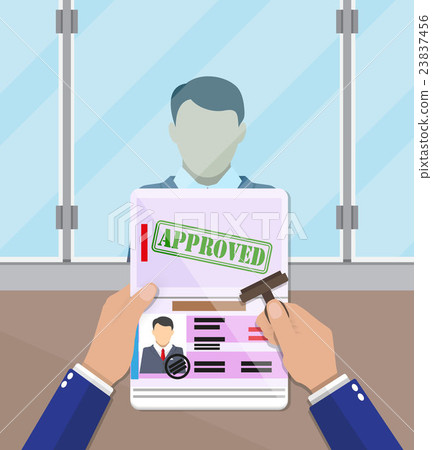 officer putting a stamp in the passport officer putting a stamp in the passport 23837456