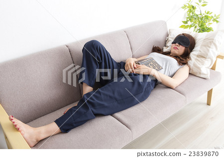 A woman taking a nap 23839870