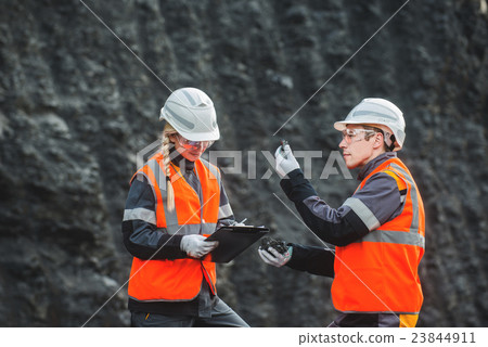 Workers with coal at open pit Workers with coal at open pit 23844911