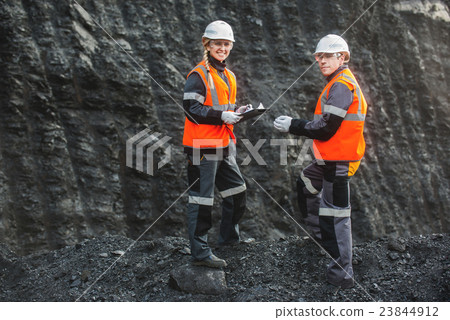 Workers with coal at open pit Workers with coal at open pit 23844912
