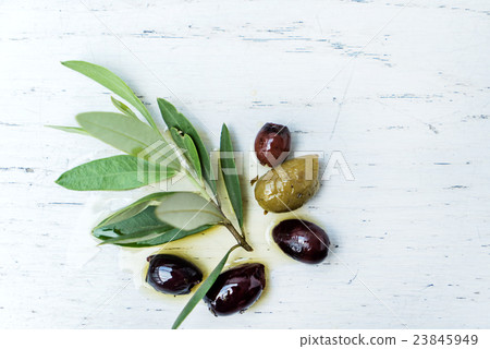 olives with leaves and oil 23845949