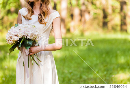 Beautiful bride with flowers 23846034