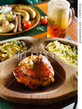 eisbein with braised cabbage, salad and beer eisbein with braised cabbage, salad and beer 23846318