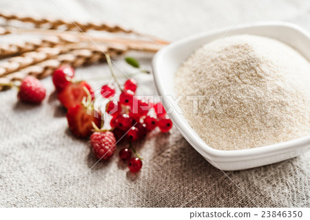 Raw unprepared semolina in bowl 23846350