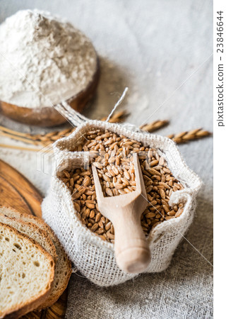 Wheat and flour on the table Wheat and flour on the table 23846644