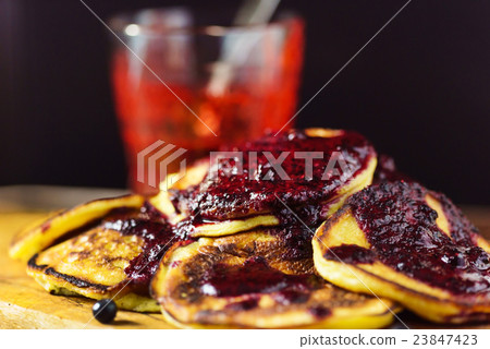 pancakes with blueberry sauce pancakes with blueberry sauce 23847423