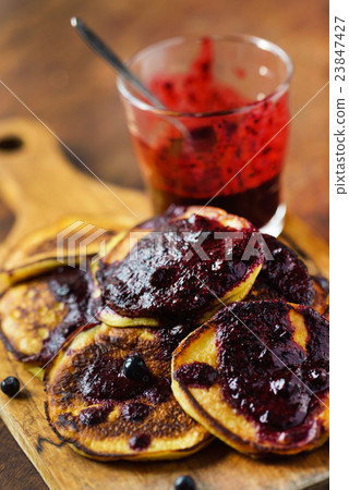 pancakes with blueberry sauce pancakes with blueberry sauce 23847427