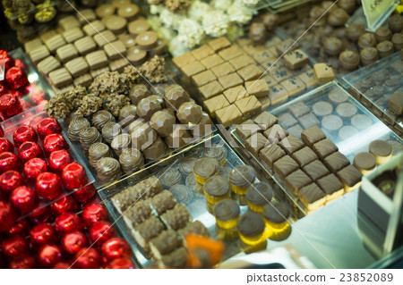 Assortment of chocolates with ganache and pralines fillings Assortment of chocolates with ganache and pralines fillings 23852089