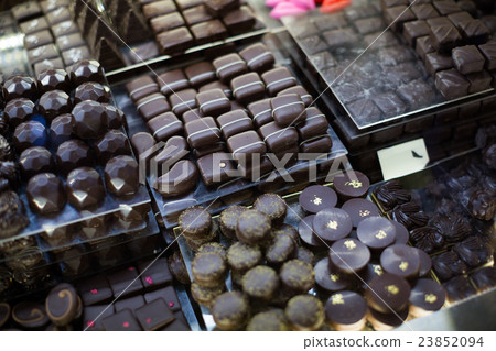 Assortment of chocolates with ganache and pralines fillings Assortment of chocolates with ganache and pralines fillings 23852094