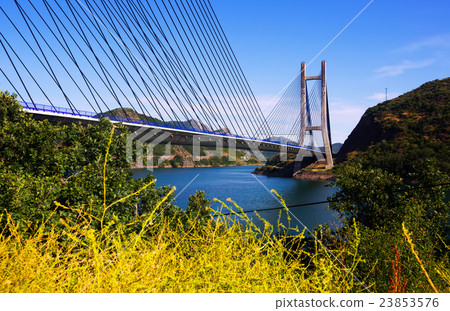 Cable-stayed bridge over lake Cable-stayed bridge over lake 23853576