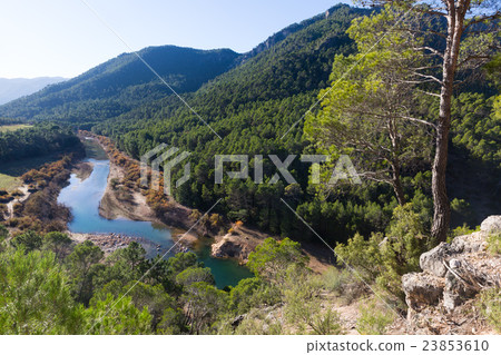 Mountains river with forest riverside Mountains river with forest riverside 23853610