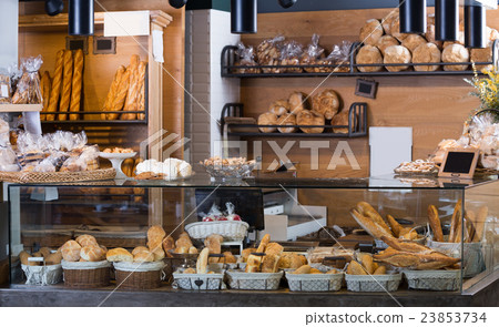 Display of ordinary bakery with bread and buns 23853734