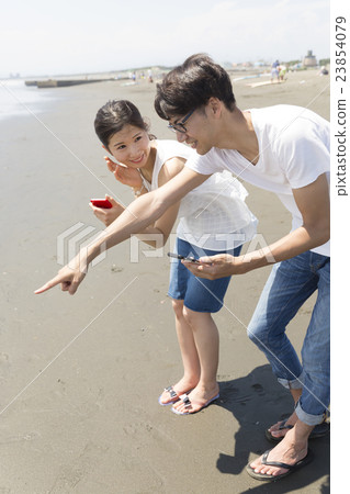 Pokemon GO image blue sky couple beach beach shonan enoshima pointing finger pointing she sees him Pokemon GO image blue sky couple beach beach shonan enoshima pointing finger pointing she sees him 23854079