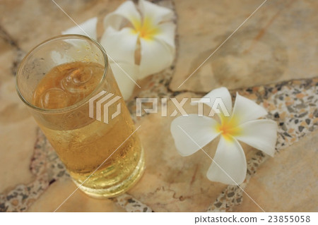 Beer glass with ice 23855058