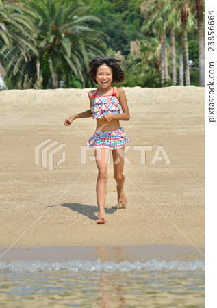 A girl who enjoys swimming A girl who enjoys swimming 23856664