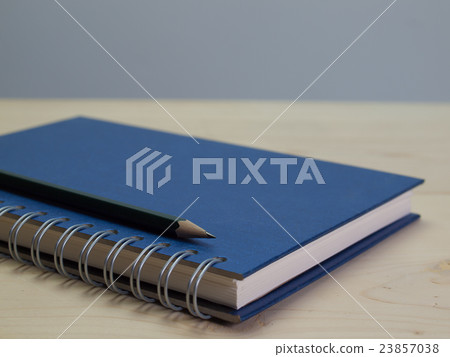 Book and pencil 23857038