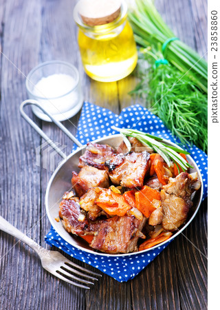 fried meat with vegetables fried meat with vegetables 23858860
