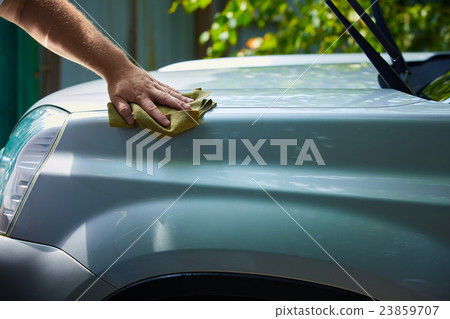 Close-up Of Hand With green Brush Washing Car Close-up Of Hand With green Brush Washing Car 23859707