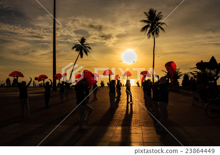 Local people exercise in sunrise at Nha Trang Local people exercise in sunrise at Nha Trang 23864449