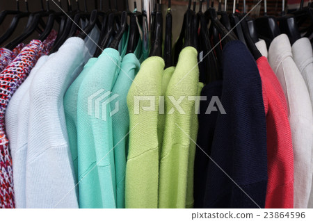 Pullovers on hangers. Pullovers on hangers. 23864596